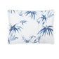 The Dominique Bedding Collection, Azure by Matouk features a rectangular white pillow made from OEKO-TEX® certified Egyptian cotton with a bold blue bamboo leaf pattern on a plain white background.