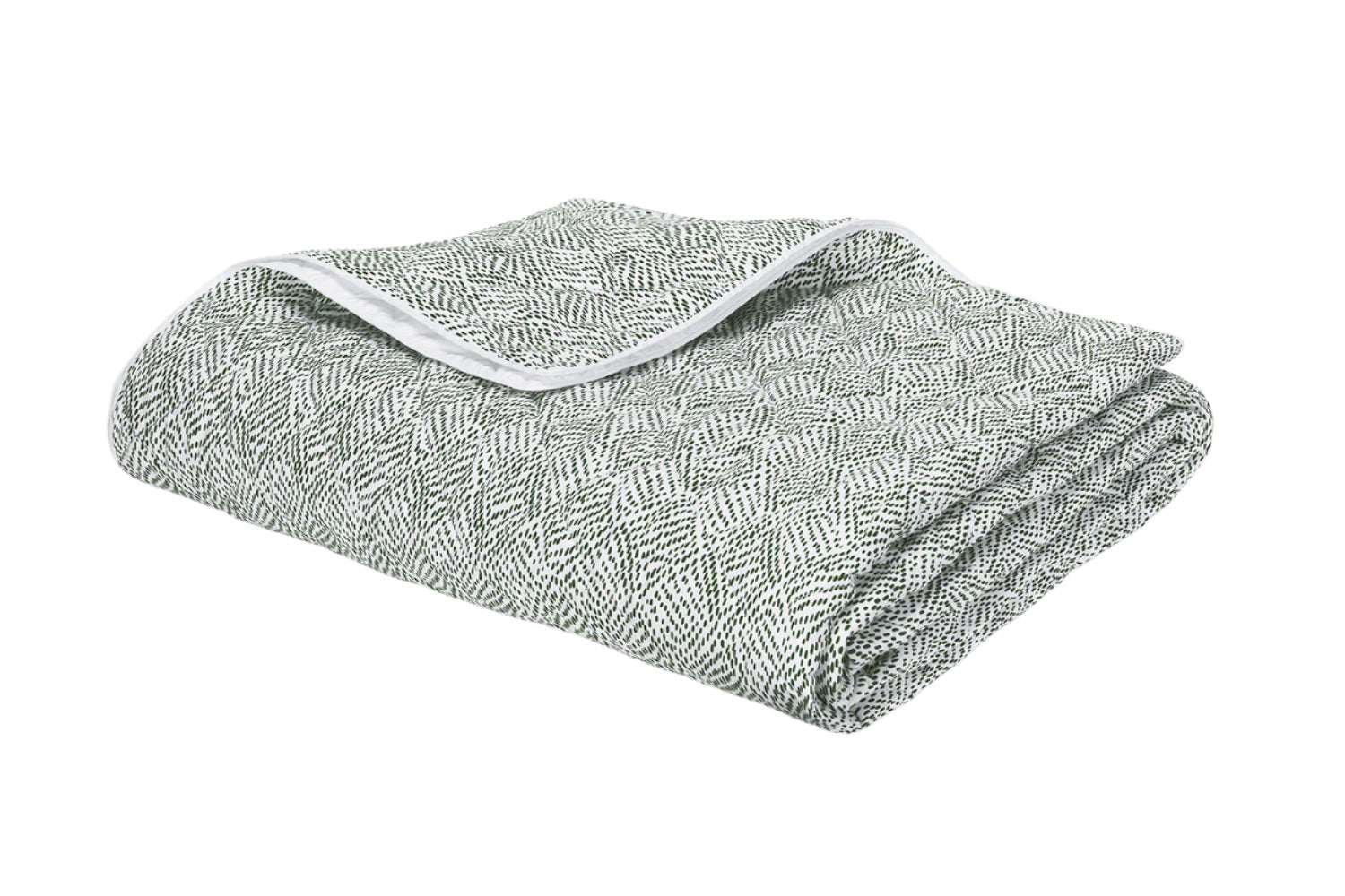 A folded blanket from the Matouk Duma Diamond Bedding Collection, featuring a green and white harlequin-inspired diamond pattern with crisp white trim, crafted from luxurious Egyptian cotton percale, is displayed on a plain white background.