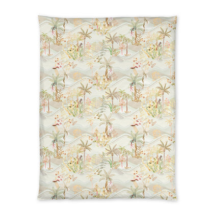 The Christian Fischbacher Satin Oasis Bedding Collection features a rectangular blanket with a pastel tropical landscape of palm trees and plants—ideal for luxury bedding and an oasis-inspired linen look.