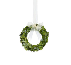 The Park Hill Collection Preserved Boxwood Wreath features green leaves and a sheer white ribbon—ideal for decorative use. Part of the Preserved Boxwood Wreath Collection.