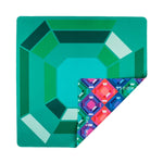 The Mahjong House Double-Sided Travel Mahjong Mat features a square, gem-patterned green surface with one corner flipped to show a vibrant geometric design and the brand name "HOUSE.