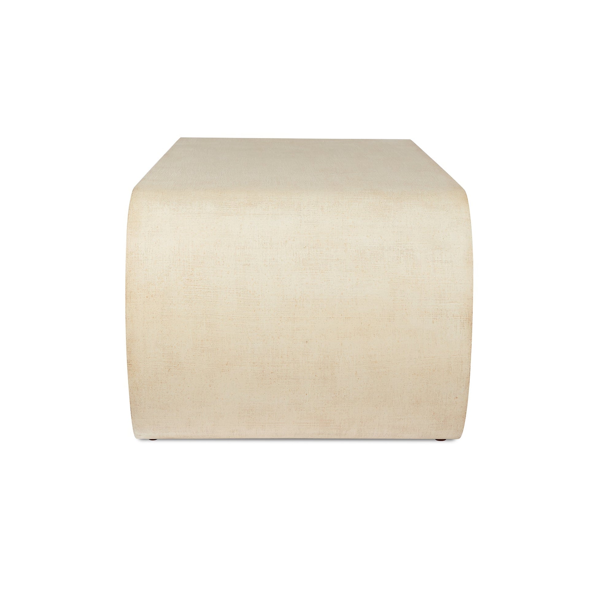 The Emilia Coffee Table by Bunny Williams features a square, cream-colored design with rounded edges and a painted linen finish, shown from the front against a white background.
