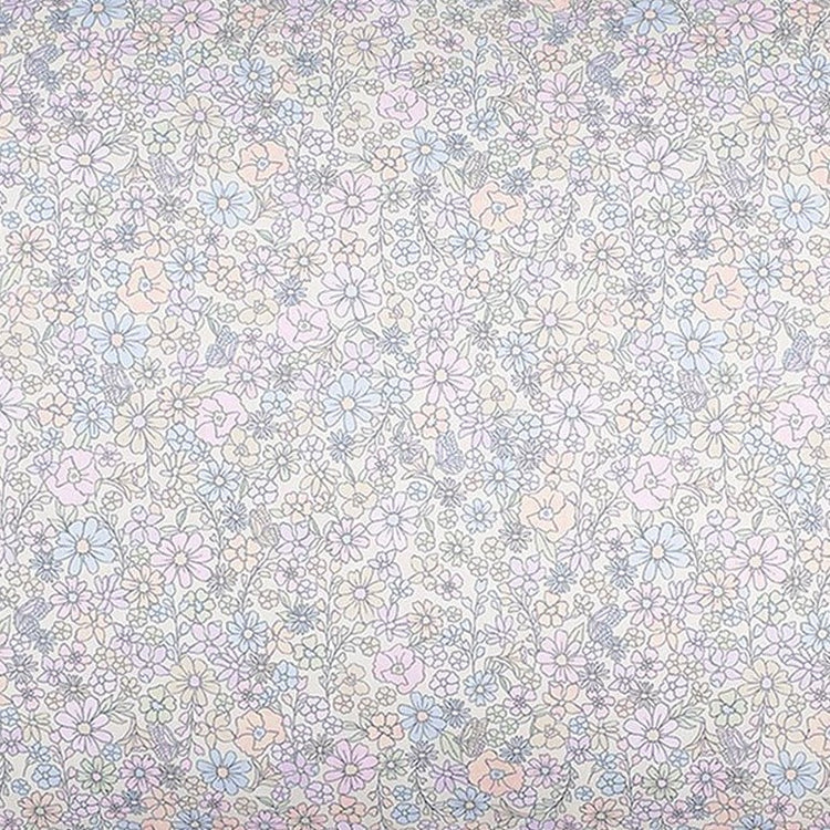 Immerse your little one in the Enchanted Wildflowers Bedding Collection by Gooselings, featuring a dense pattern of light pastel flowers and leaves delicately arranged on a crisp white background. Made from pure materials and OEKO-TEX certified, this breathable baby blanket seamlessly blends beauty and comfort for your child’s nursery.