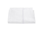 Two white pillowcase covers from the Matouk Essex Bedding Collection, made with luxurious 350 thread count fabric and satin stitch embroidery, are stacked against a white background.