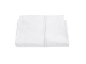 Two white pillowcase covers from the Matouk Essex Bedding Collection, made with luxurious 350 thread count fabric and satin stitch embroidery, are stacked against a white background.