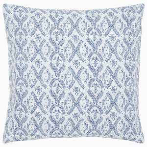 The Aashna Azure Bedding Collection by John Robshaw features a square pillow with a white background and blue floral and vine diamond tilework, inspired by Portuguese artisans, crafted from soft cotton jacquard.