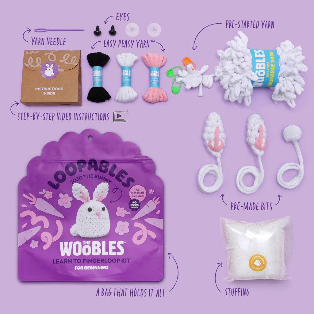 Featuring loopable yarn, a crochet needle, pre-made parts, stuffing, instructions, and a purple storage bag, The Woobles Jojo the Bunny Beginner Crochet Kit is the perfect fingerloop kit for anyone looking to create their own Jojo the Bunny.