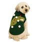 A small dog wears the Found My Animal Icon Sweater—a playful green design with a mini golf course, red flags, and white golf balls attached.