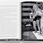 An open Fontainebleau book by Assouline shows a black-and-white photo of two people in swimwear on a diving board at the iconic hotel pool, with text on the left page capturing its architectural marvel.