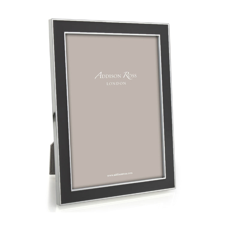 The Addison Ross Enamel and Silver Frame Collection features an elegant standing frame with a slim black enamel border, silver edges, and a versatile two-way easel, shown on a white background.
