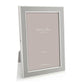 The Enamel and Silver Frame Collection by Addison Ross features a silver-plated enamel frame with a plain insert, upright display, and a versatile two-way easel for flexible positioning.