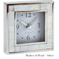 Addison Ross Square Silver Alarm Clock Collection features a mother of pearl and silver frame, black numerals and hands on a white face. "Mother of Pearl + Silver" text. Elegant addition to any nightstand.