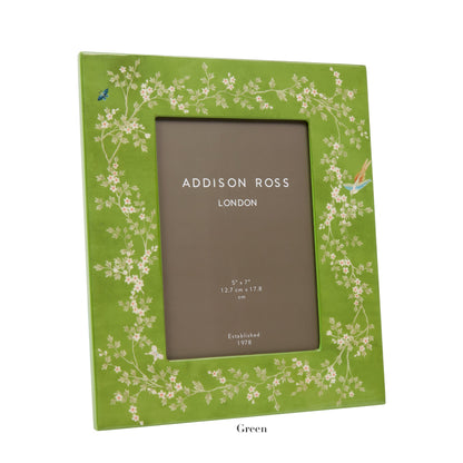 The Addison Ross Chinoiserie Frame Collection features a green frame with a blossom design and high-gloss lacquer for elegance. It has an interior label, "Addison Ross London," and measures 5'' x 7''.