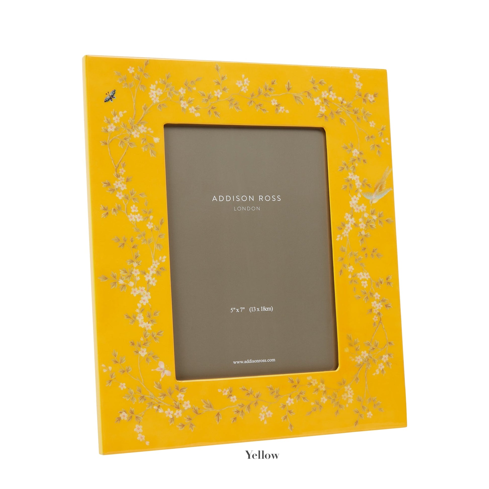 The Addison Ross Chinoiserie Frame Collection offers a yellow photo frame featuring floral patterns and a high-gloss lacquer finish. It displays an "ADDISON ROSS LONDON" placeholder and holds a 5" x 7" (13 x 18cm) picture.