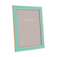 A rectangular Addison Ross Gold Trim Enamel Frame features a light blue enamel and gold border, displaying an "Addison Ross London" placeholder on a neutral background.