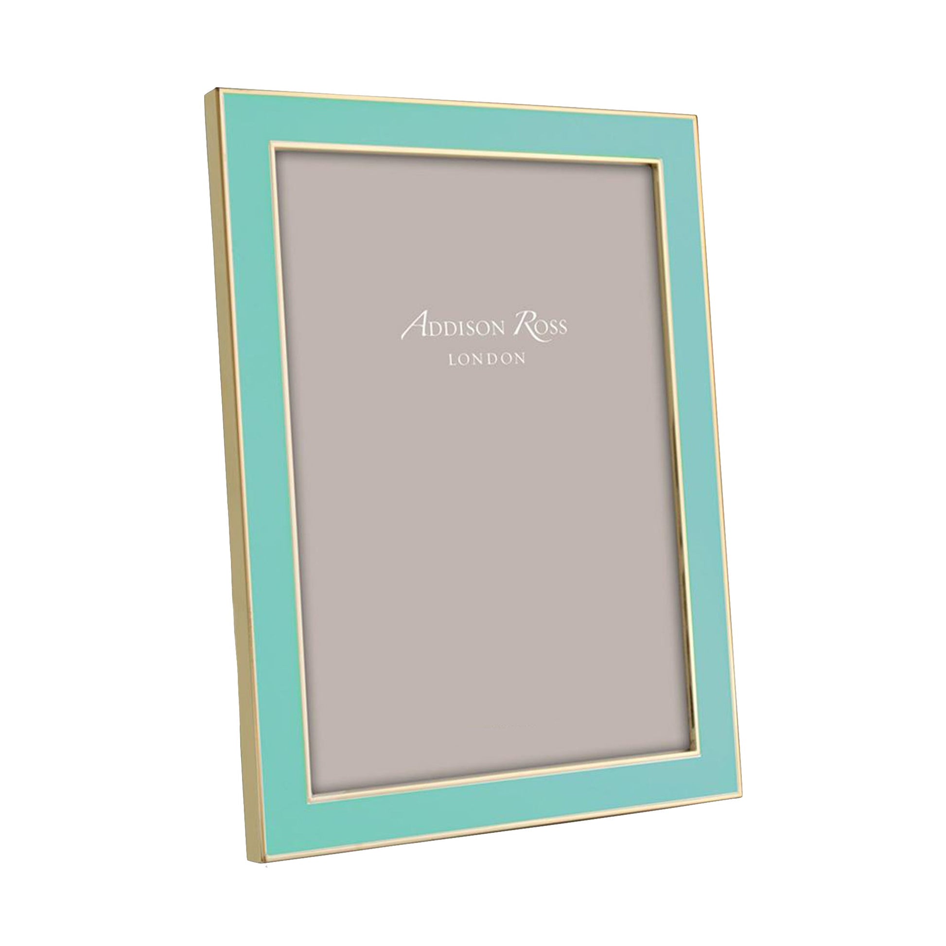 A rectangular Addison Ross Gold Trim Enamel Frame features a light blue enamel and gold border, displaying an "Addison Ross London" placeholder on a neutral background.