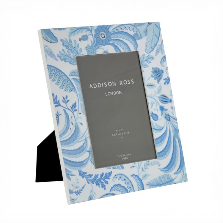 The Addison Ross Palm Beach Frame Collection features a blue and white floral-patterned lacquered photo frame with a high-gloss finish, black velvet backstand, and a placeholder card labeled "Addison Ross London.
