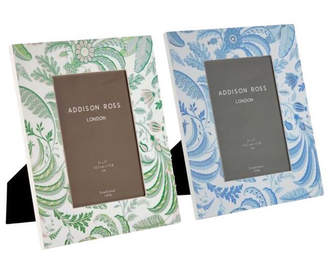 Two Addison Ross Palm Beach Frame Collection high-gloss lacquer frames, one green and white and one blue and white, both with floral patterns and elegant black velvet backstands.