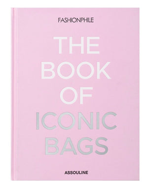 Fashionphile: The Book of Iconic Bags" is a pink hardcover by Assouline celebrating luxury accessories and iconic investment handbags.