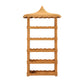 The Georgina Rattan Bookcase by Made Goods is a tall wicker shelving unit featuring five shelves, a woven pagoda-style roof with scalloped edges, and an elegant design, shown isolated on a white background.