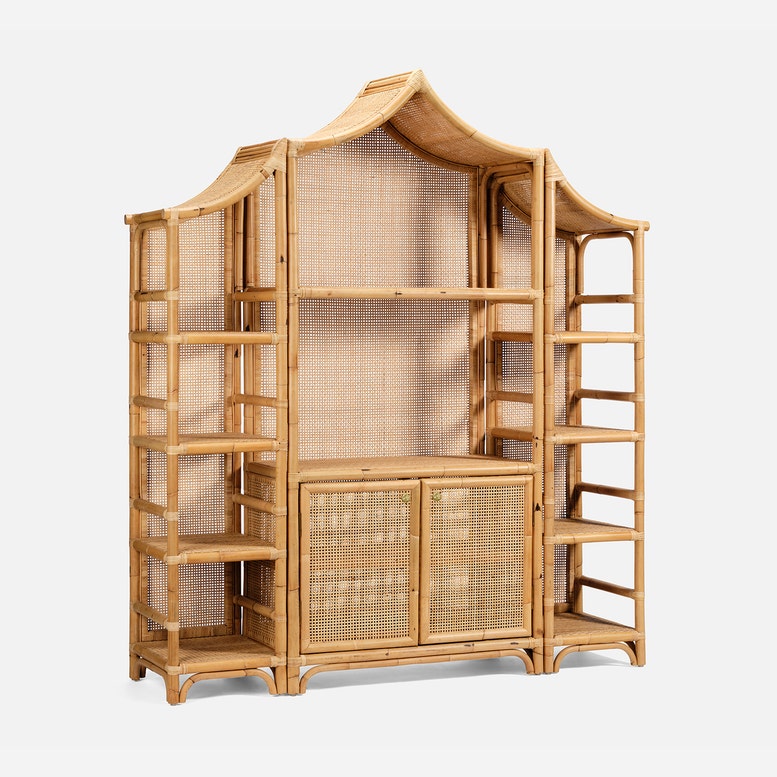 Elevate any space with the Lainey 3 Piece Bookcase Set by Made Goods, featuring tall rattan open shelving, a striking pagoda-inspired curved top, and two lower cabinet doors with woven cane panels—a true centerpiece for your home.
