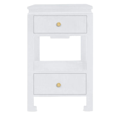 The Wylder Nightstand Collection by Made Goods features an elegant white wood nightstand with two drawers, gold knobs, and a shelf between the drawers.