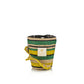The Baobab Collection Fety Milalao Candle by Baobab features a woven, multicolored striped cover in green, yellow, and tan hues and is infused with a soothing ylang-ylang scent.