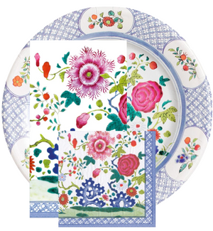 The Caspari Floral Porcelain Collection features a decorative plate and two overlapping triple-ply napkins, all adorned with vibrant pink, red, and green floral designs.