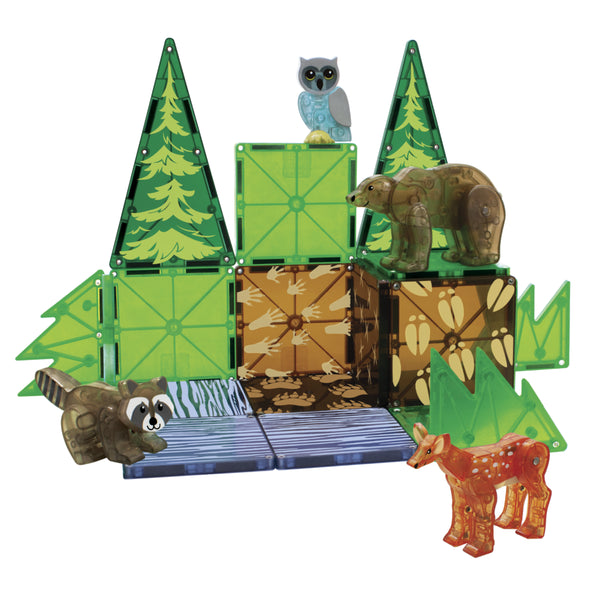 Toy set featuring Magna-Tiles Forest Animals (owl, bear, raccoon, deer) and foldable cardboard trees and panels with nature designs.