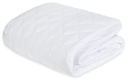 The Matouk Foundation Mattress Pad, featuring a white quilted diamond pattern, is crafted from 520 thread count fabric and OEKO-TEX certified—ensuring premium comfort and peace of mind.