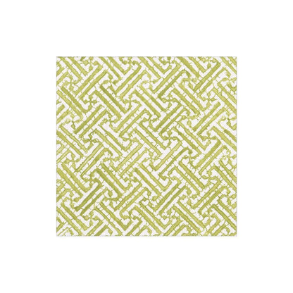 The Fretwork Collection by Caspari features square tiles with a green and white geometric zigzag pattern, displaying an interlocking design that's durable and perfect for modern spaces.