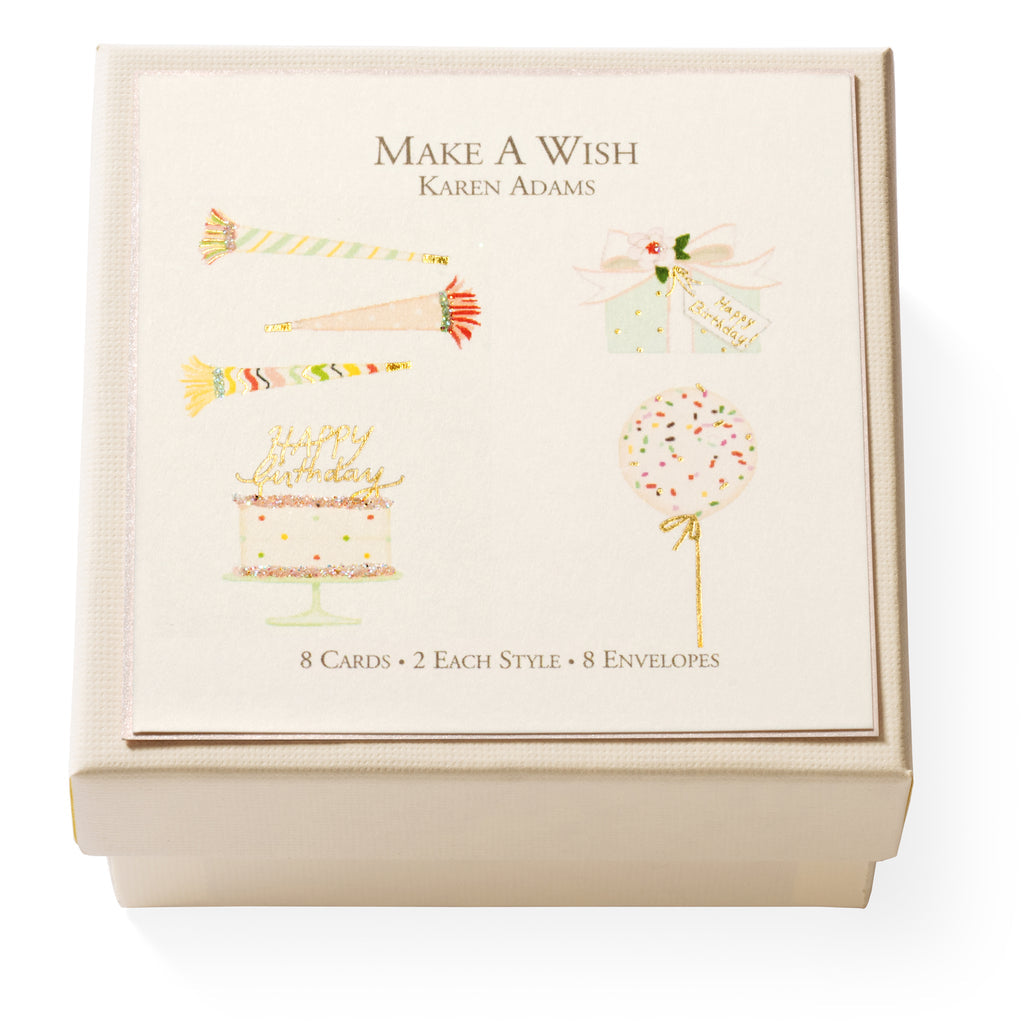 The "Make A Wish Gift Enclosures" by Karen Adams include 8 hand-glittered greeting cards in 4 festive birthday designs (candles, gift, cake, balloon) with gold foil accents and 8 envelopes.