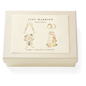 The Karen Adams Just Married Card Set features a cream box with wedding-themed illustrations and includes 8 natural white note cards (4 styles) plus 8 envelopes—making it a charming hostess gift.