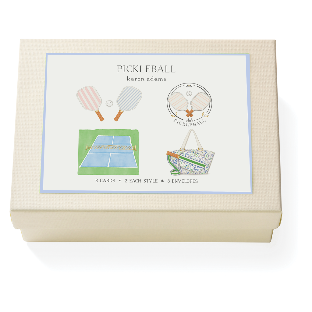 The Karen Adams Pickleball Card Set includes 8 hand-embellished note cards in 2 styles and 8 envelopes, with paddle, court, and bag illustrations—an ideal hostess gift.