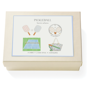 The Karen Adams Pickleball Card Set includes 8 hand-embellished note cards in 2 styles and 8 envelopes, with paddle, court, and bag illustrations—an ideal hostess gift.