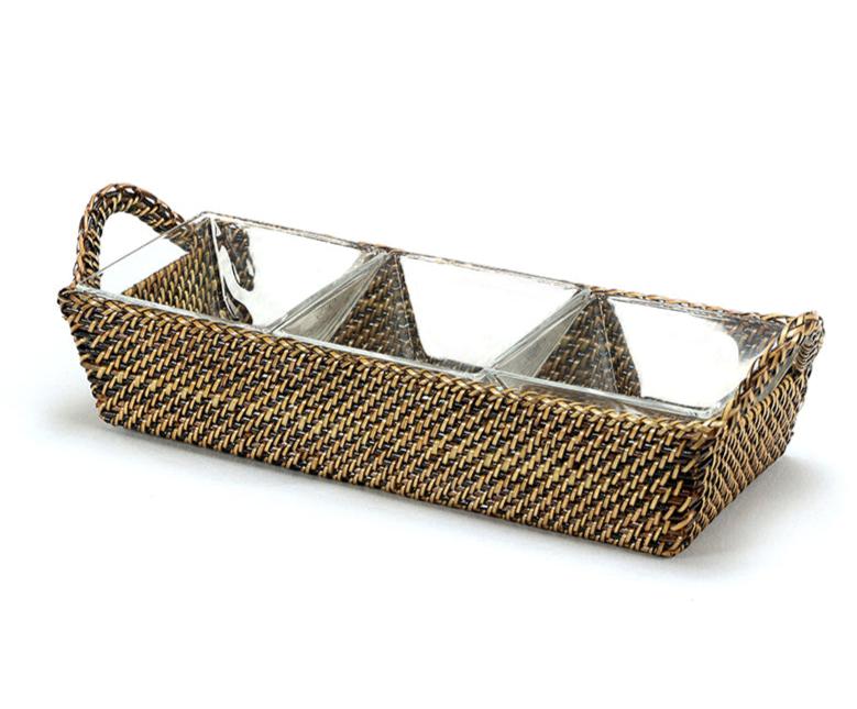 Calaisio’s Sectional Server Collection features a rectangular handwoven basket with a handle and three clear Italian glass inserts arranged side by side.