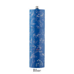 A blue floral Chinoiserie Salt and Pepper Mill from Addison Ross sits on a rubber wood base, with a small round silver knob on top. The word "Blue" appears beneath the container.