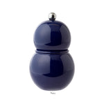 The Addison Ross Chubbie Salt and Pepper Mill Collection in "Navy" features a dark blue, round design with a high gloss lacquer finish and a silver knob. This elegant mill boasts a durable ceramic mechanism for smooth, precise grinding.