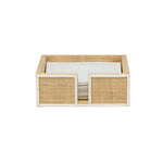 The Gable Natural/White Barware Collection by Blue Pheasant features a rectangular woven napkin holder with leather trim and a stack of white napkins, shown against a plain white background.
