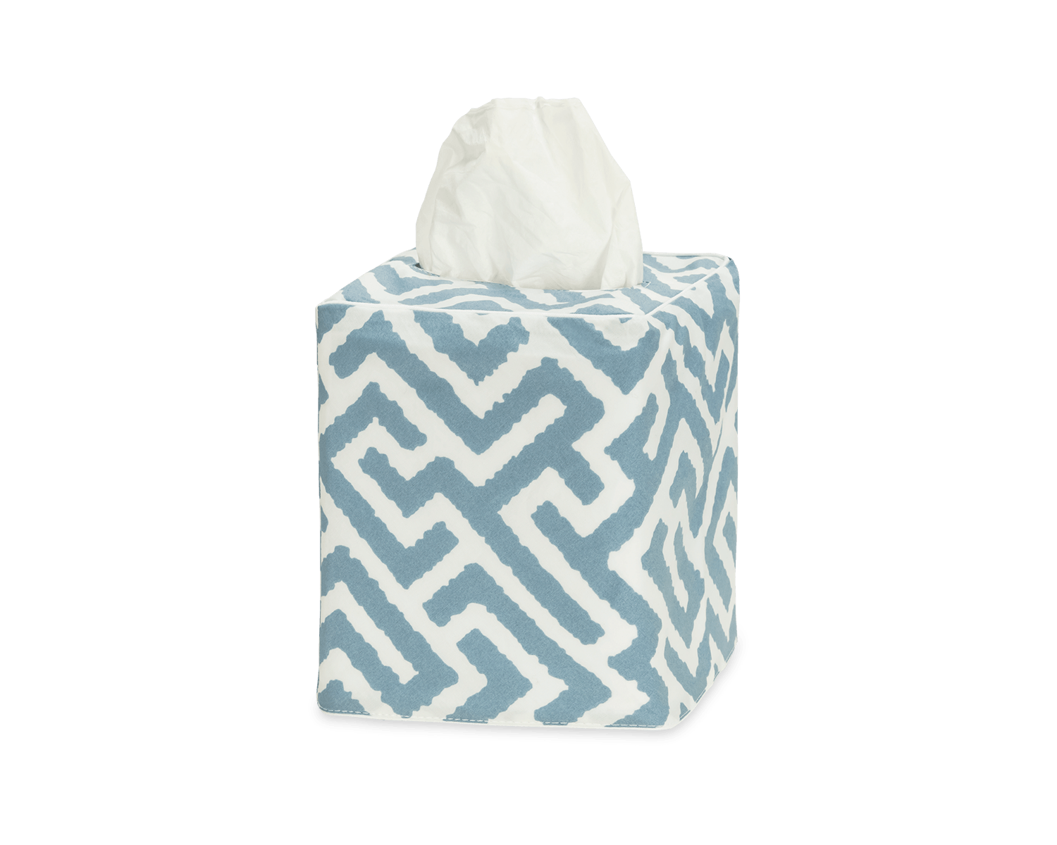 The Gabriel Tissue Box Cover Collection by Matouk features a blue and white geometric design, adding style to any bathroom. One tissue is shown protruding from the top.