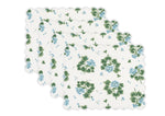 Enhance your table with Matouk's Tillett x Matouk Blue Geranium Table Linen Collection: four scalloped-edge placemats featuring a white background and a floral design of green leaves and blue flowers.