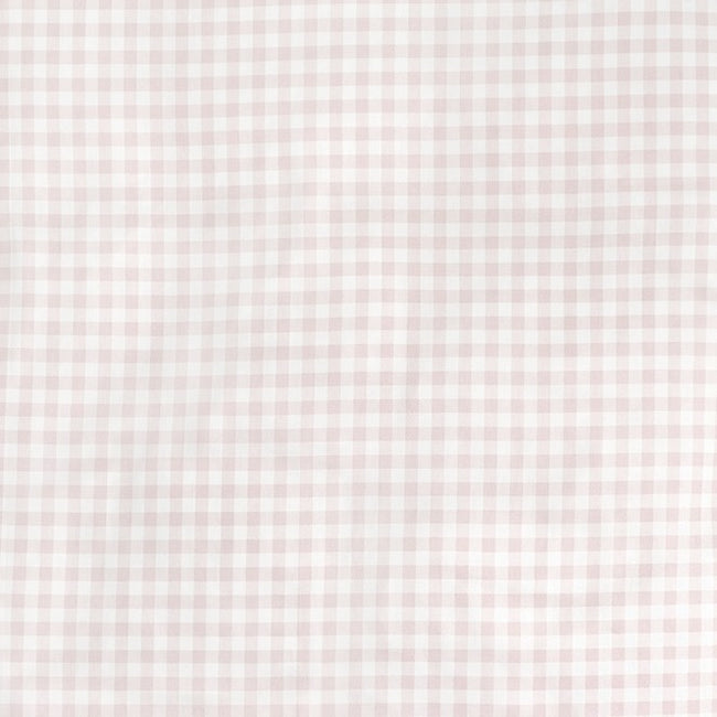 Crafted by Gooselings, the Pink Picnic Gingham Bedding showcases a light pink and white gingham pattern with small, evenly spaced checks. Made from pure materials and OEKO-TEX certified, this breathable baby blanket ensures peace of mind for you and comfort for your little one.