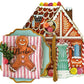 A Gingerbread Partyware Collection placemat shaped like a gingerbread house with a blue plate, red-striped napkin, “Phoebe” gingerbread man place card, gold flatware, and gumdrops.
