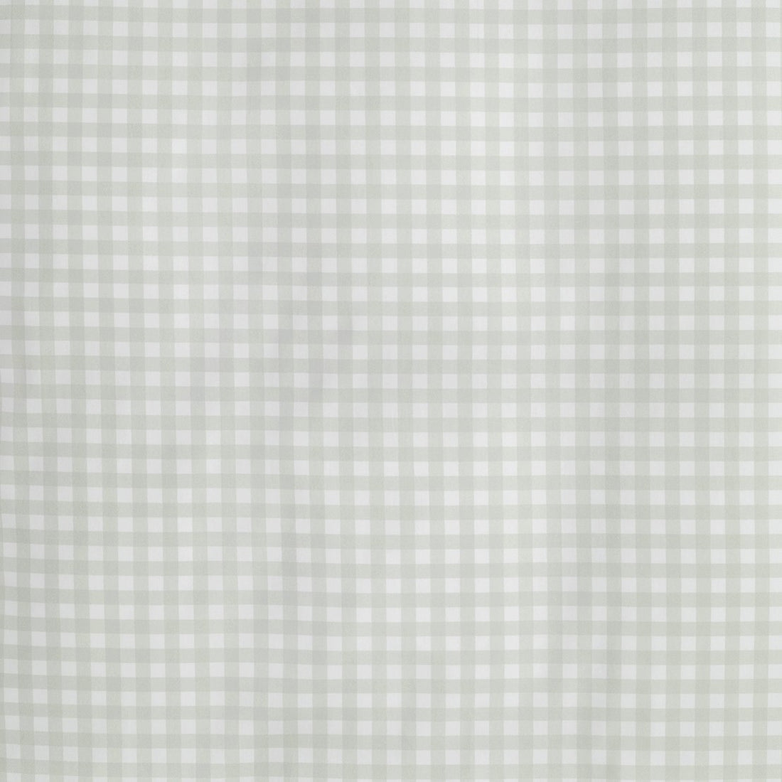 Soft green gingham checkered pattern with evenly spaced small squares—perfect for kids bedding or a cozy children’s pillow to inspire sweet dreams from the Green Picnic Gingham Bedding Collection by Gooselings.