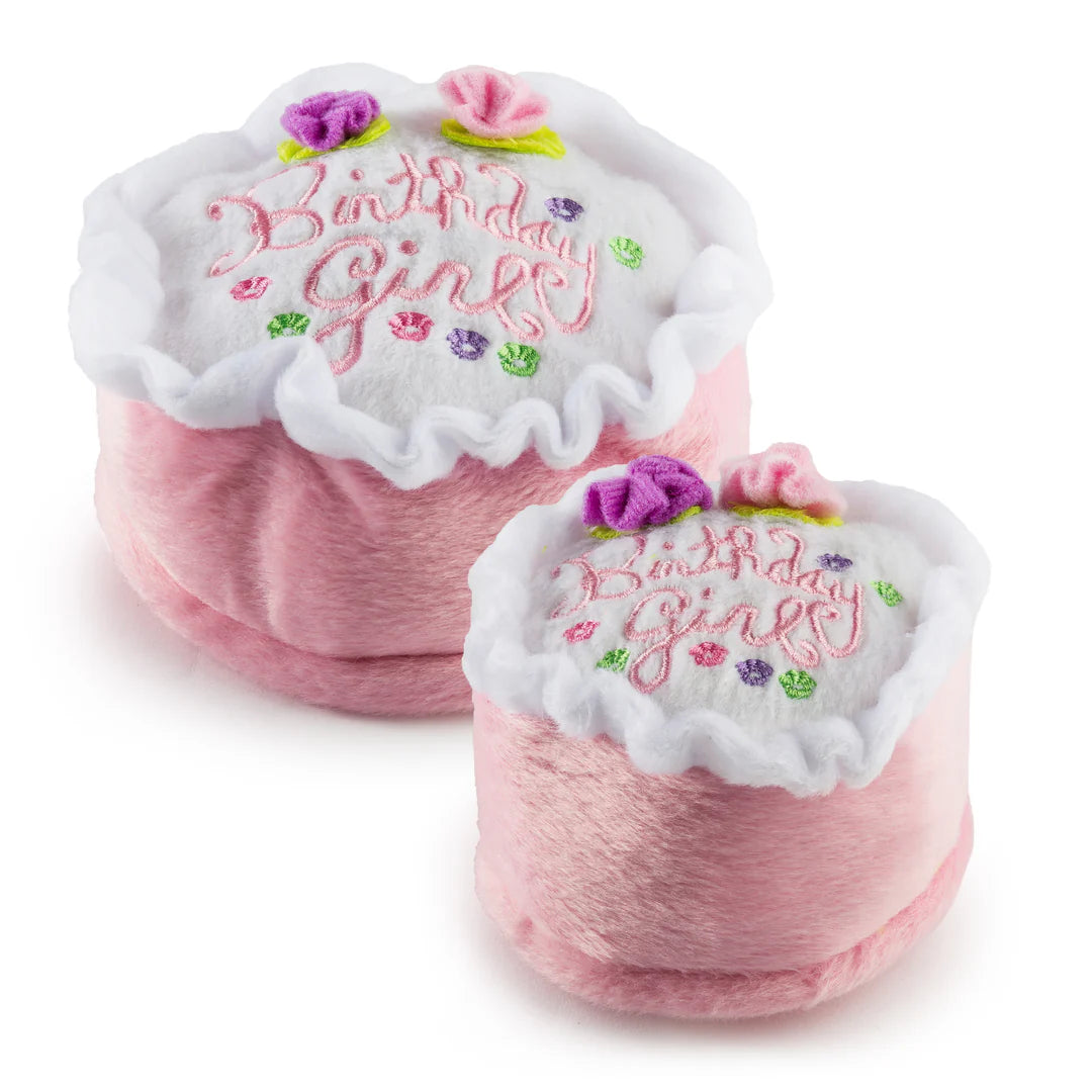 Two Haute Diggity Dog Birthday Girl Toys—pink cake slice plush with white tops, flower accents, and "Birthday Girl" embroidered in pink—are perfect dog toys for your pup's special day.