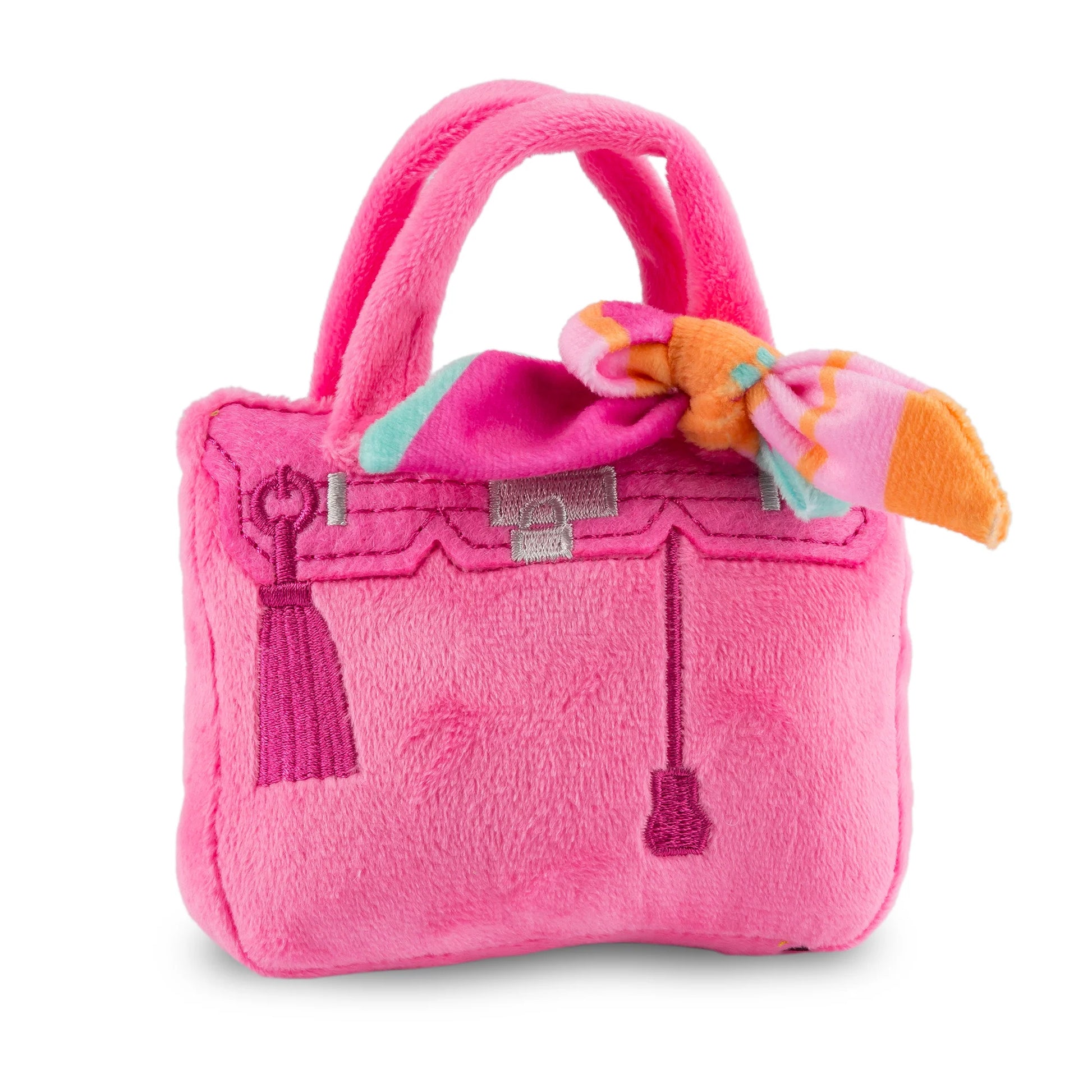 The Haute Diggity Dog Pink Barkin Bag Dog Toy features plush pink fabric, embroidered details, and a colorful scarf—bringing chic style and fun to your pup’s playtime.