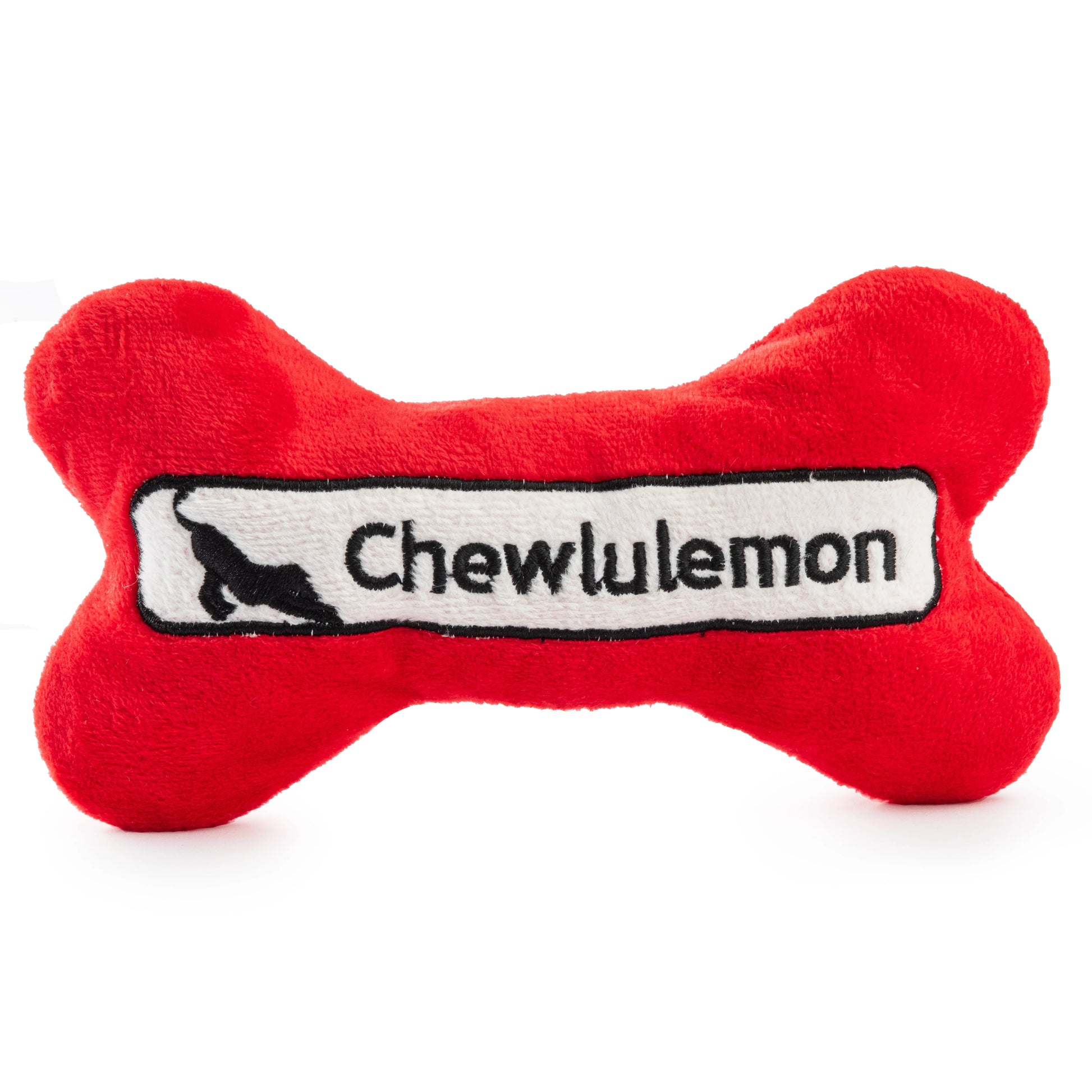The Chewlulemon Bone Dog Toy by Haute Diggity Dog features a red plush design with "Chewlulemon" lettering and a black animal patch—perfect for pups who love yoga-inspired fun.