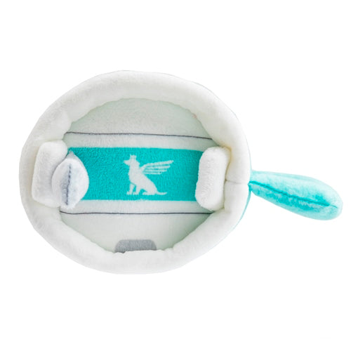 Top view of the Haute Diggity Dog Snuggly Cup Dog Toy in teal, featuring a turquoise cushion with a white winged dog silhouette and a light blue handle—perfect for your pup’s favorite plush toy.