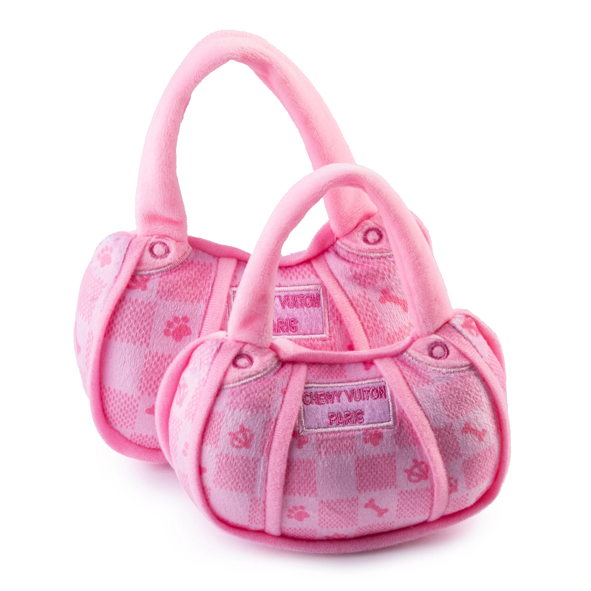 Two Pink Chewy Vuiton Handbag dog toys by Haute Diggity Dog, featuring checkered patterns, short handles, and "CHEWY VUITON PARIS" embossed front—an ideal squeaky toy for your pampered pup.