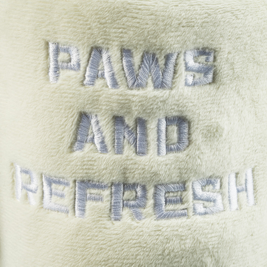 The Haute Diggity Dog Snuggly Pup Plush Toy in Ivory features white "PAWS AND REFRESH" embroidery on soft fabric. This stylish toy is perfect for playful pups who love to chew, cuddle, and play.